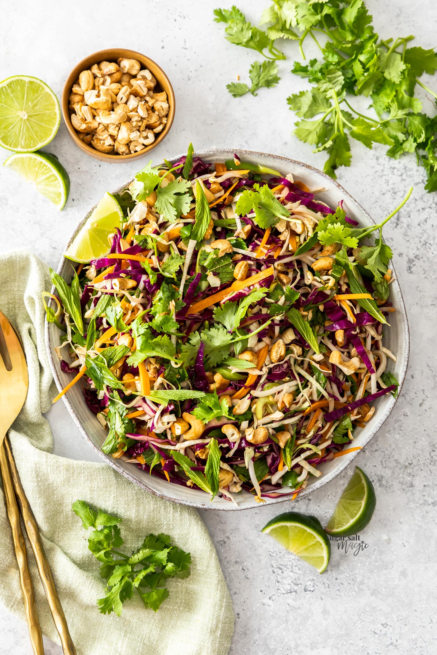 Top down view of vibrant asian salad in a bowl.