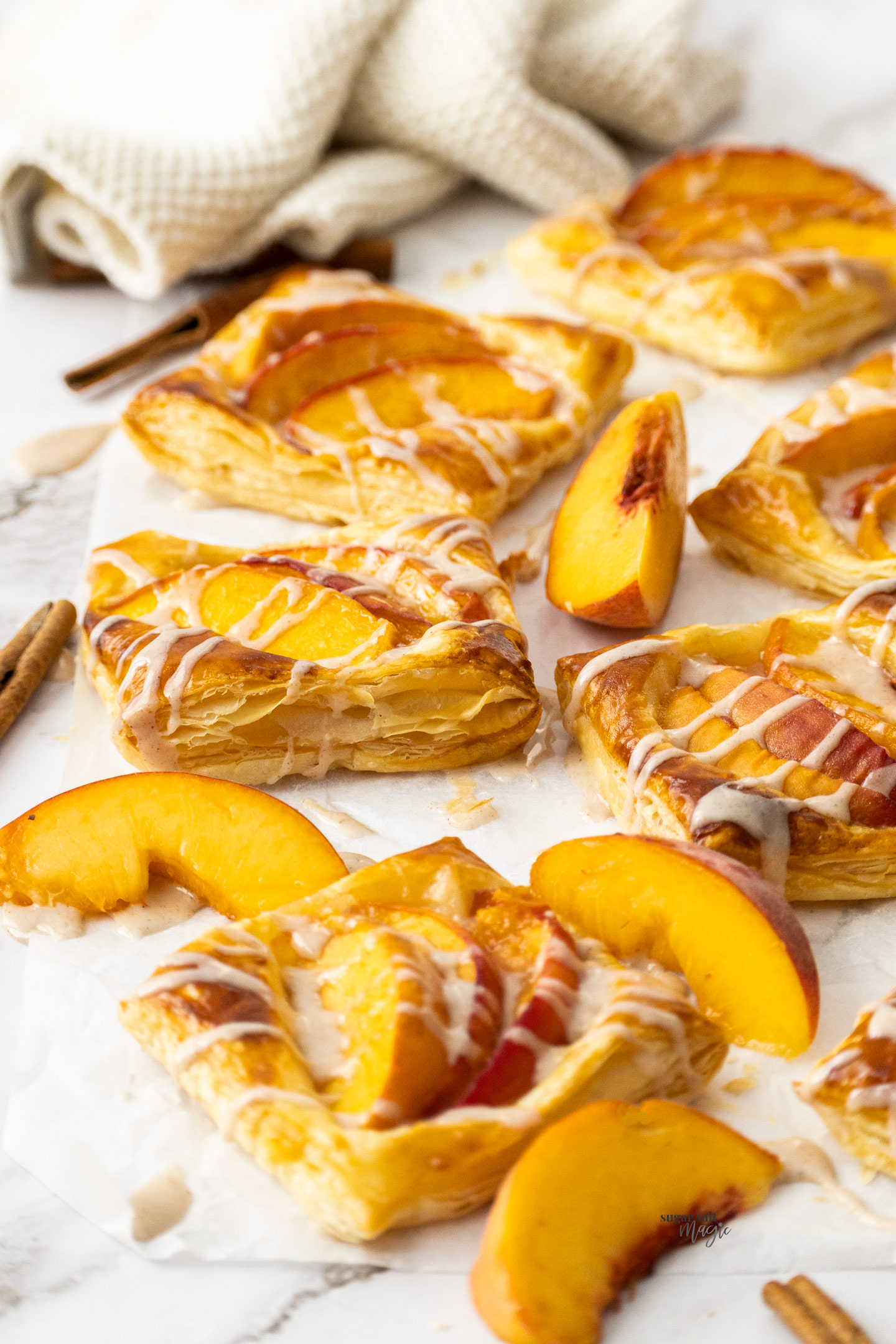 Image showing the layers of pastry on the peach tarts.