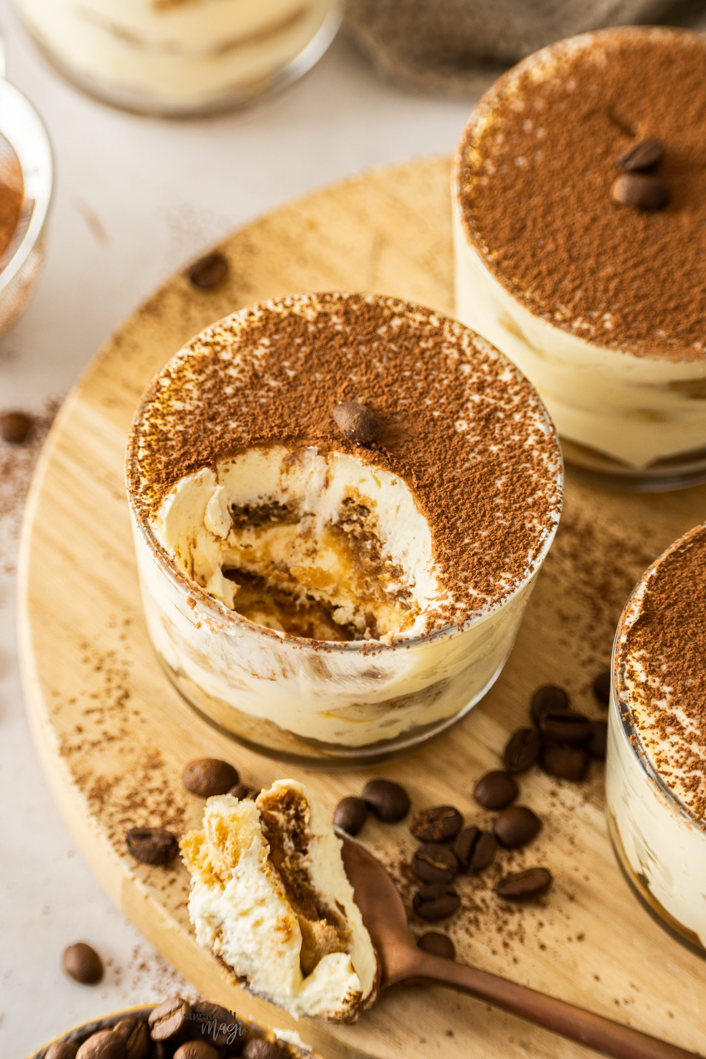 Looking into a tiramisu cup to show the layers.
