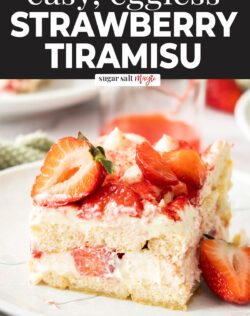 A square slice of strawberry tiramisu on a dessert plate.