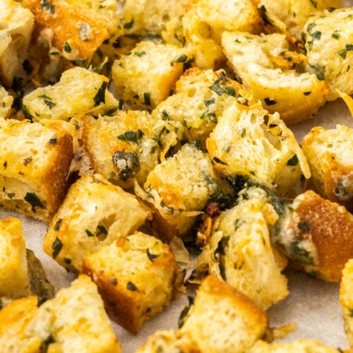 Closeup of cheese and garlic croutons.