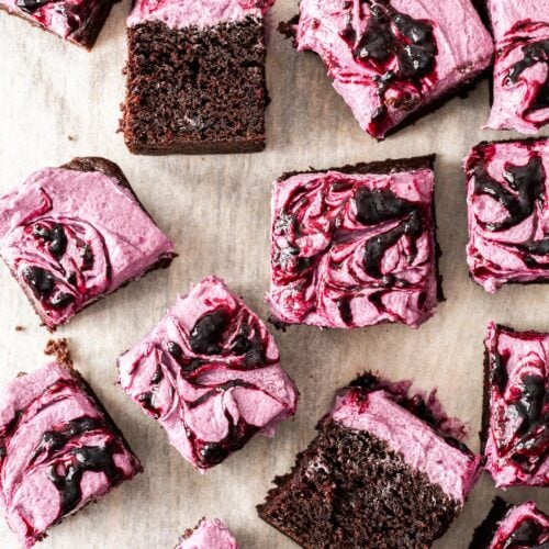 A batch of blueberry chocolate cake slices on a platter.