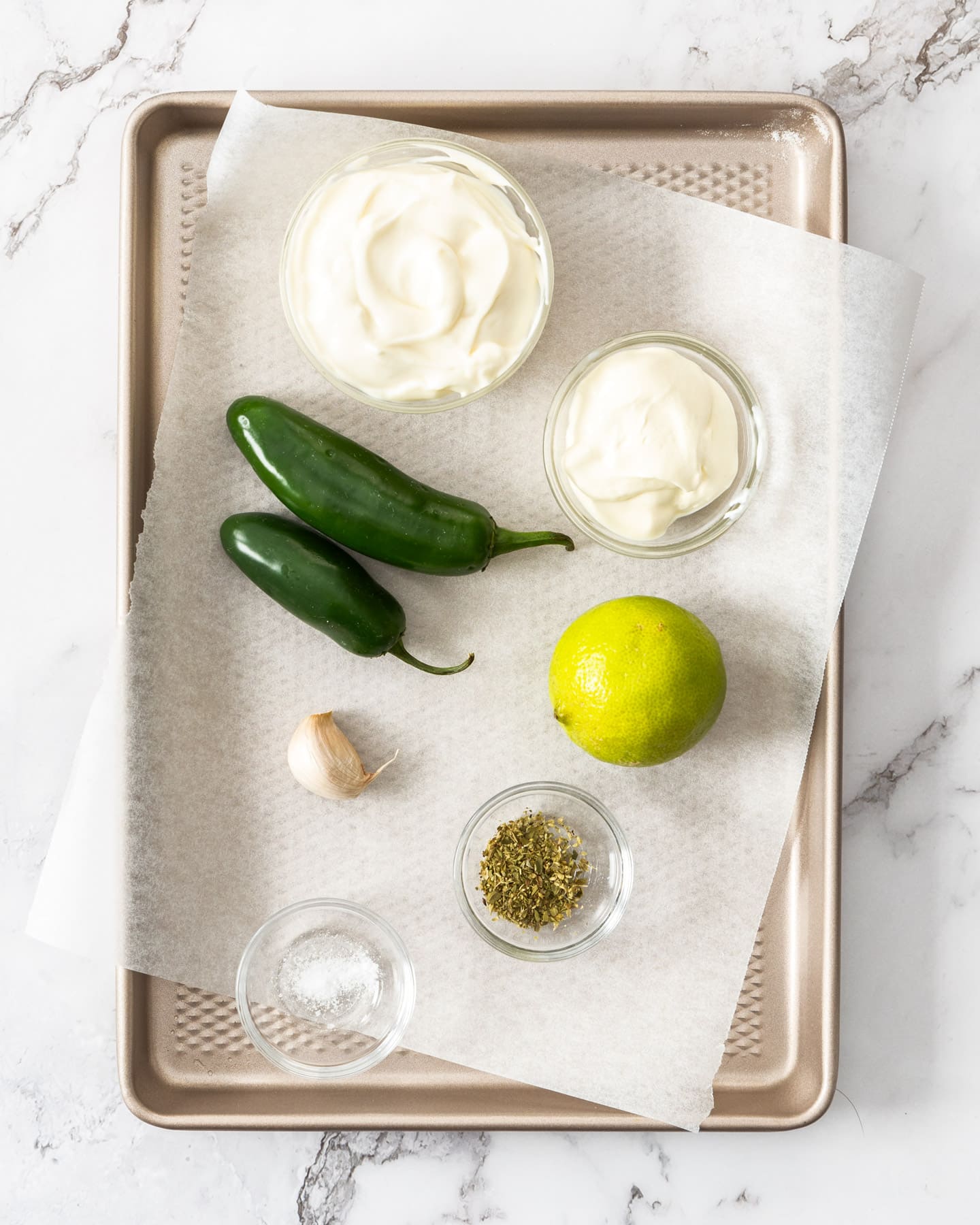 Ingredients for jalapeno mayo on a baking tray.