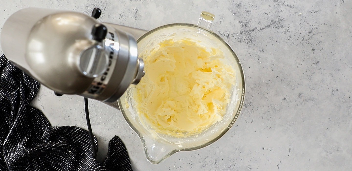 Whipped butter in a stand mixer bowl.