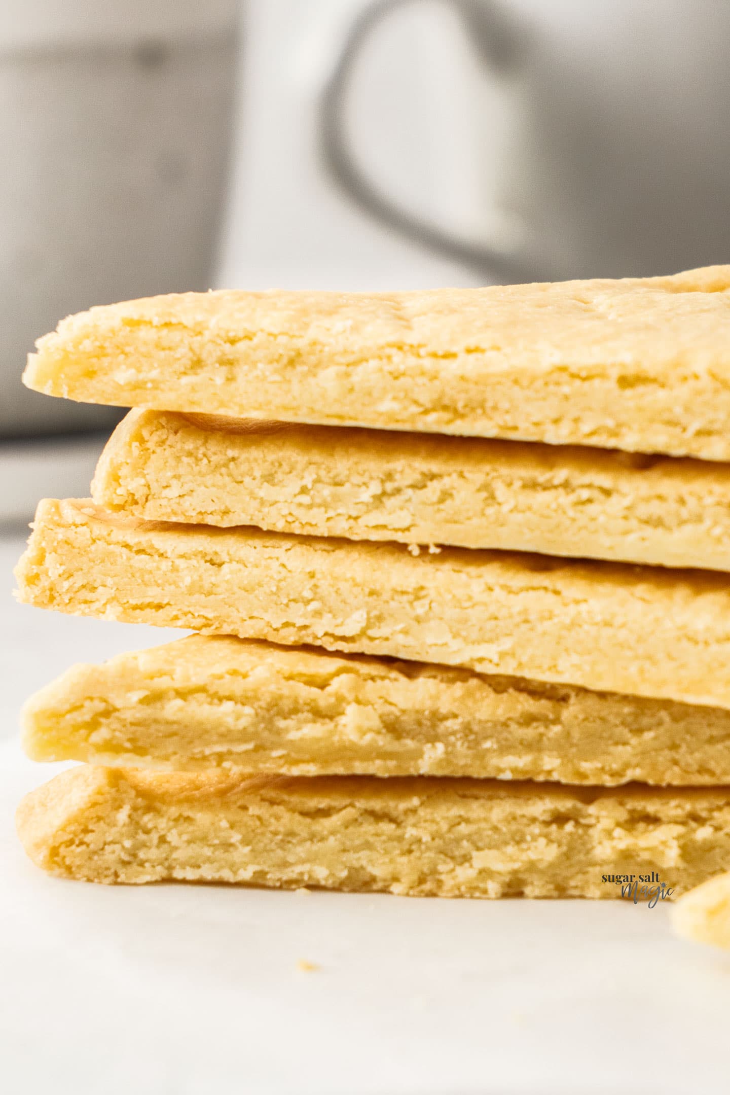 A stack of butter shortbread showing the texture.