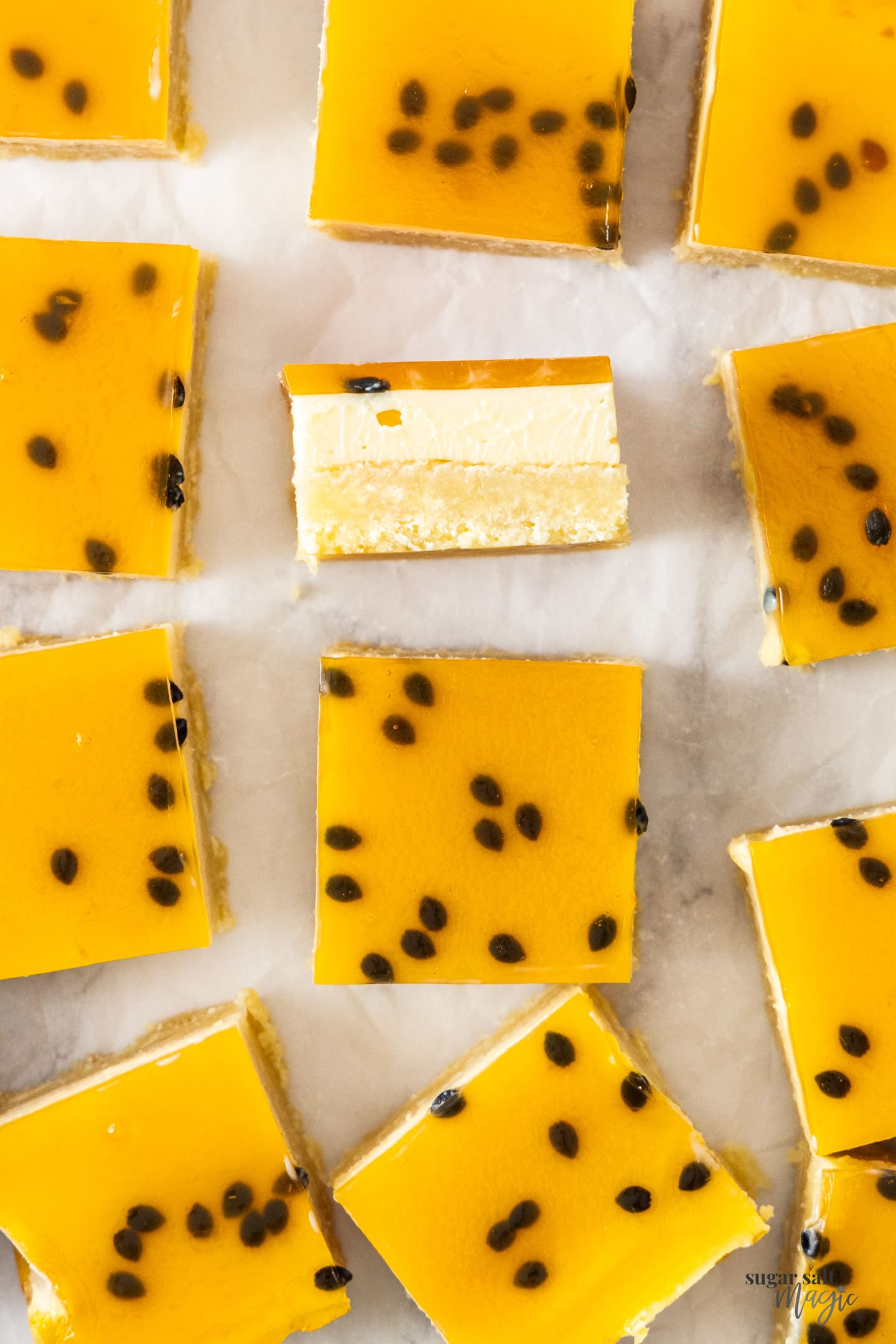 12 passionfruit slices with one on it's side.