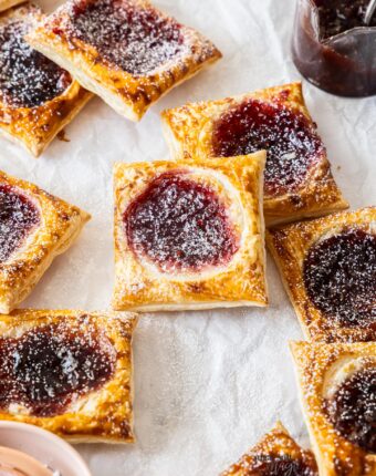 A batch of jam puff pastry tarts.