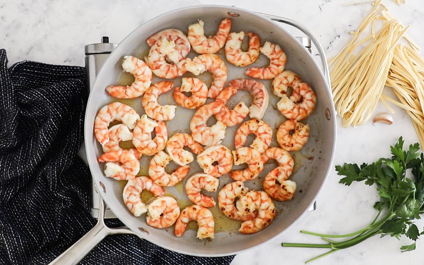 Cooked prawns in a pan.