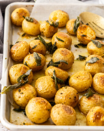 Closeup of the potatoes with crispy sage over the top.