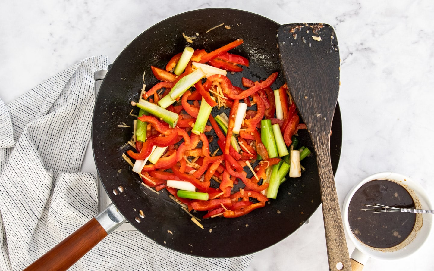 Vegetables cooking in a wok.
