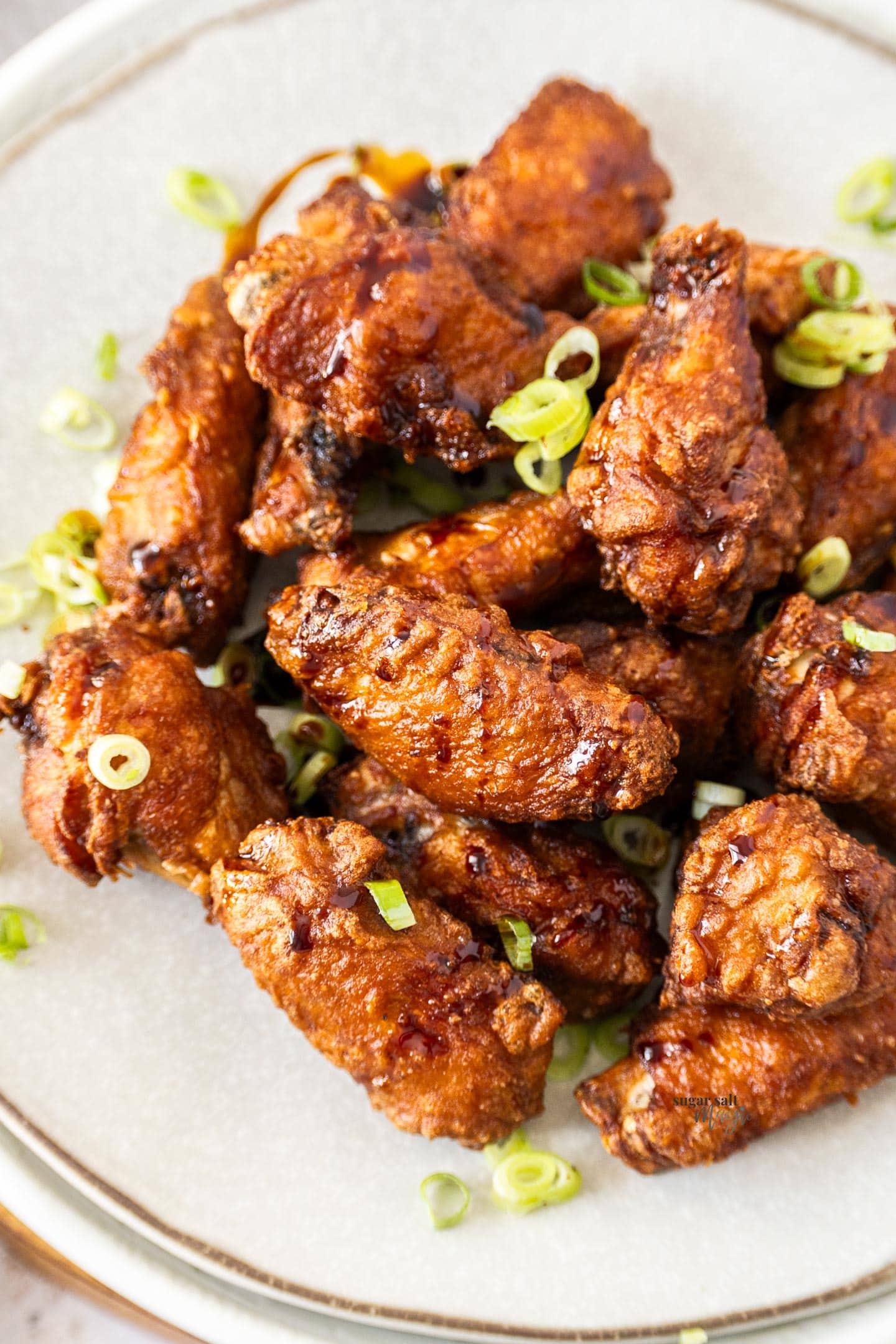 A batch of Chinese chicken wings on a plate.