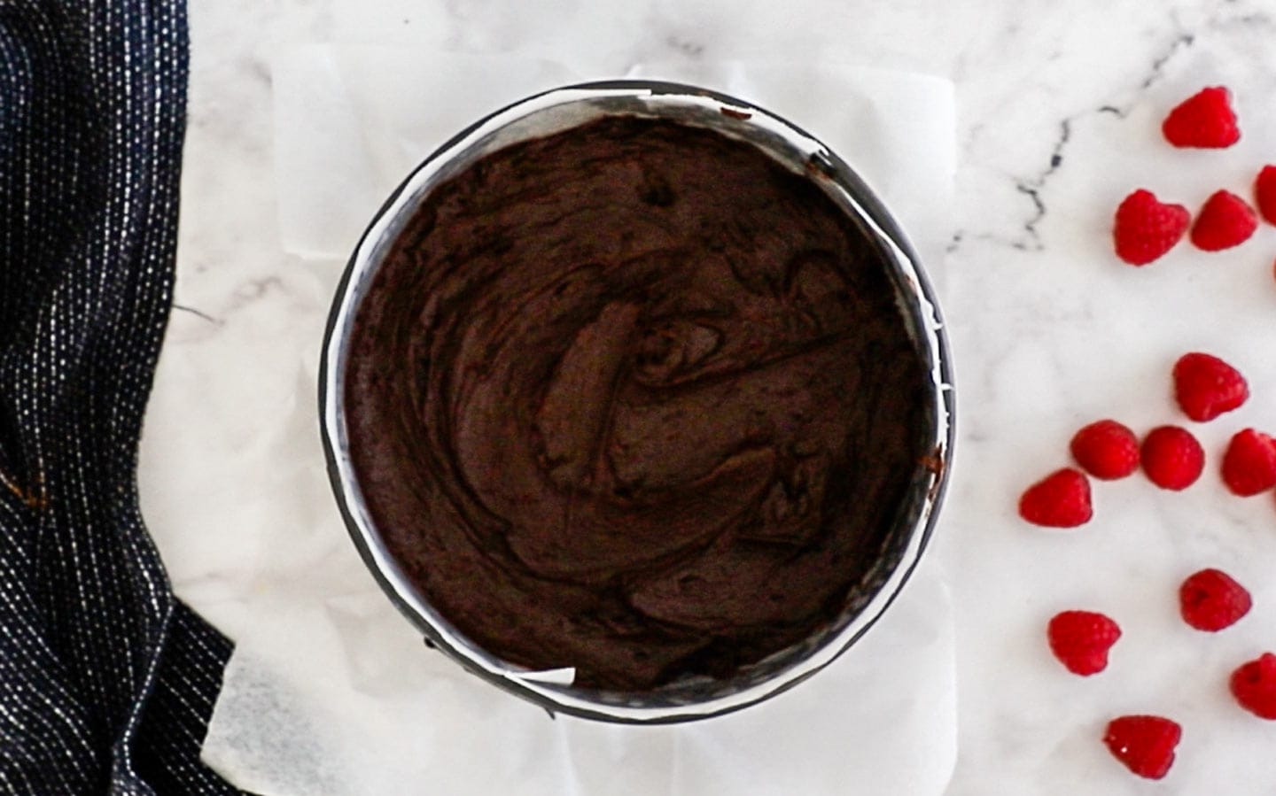 Brownie batter in a baking pan.