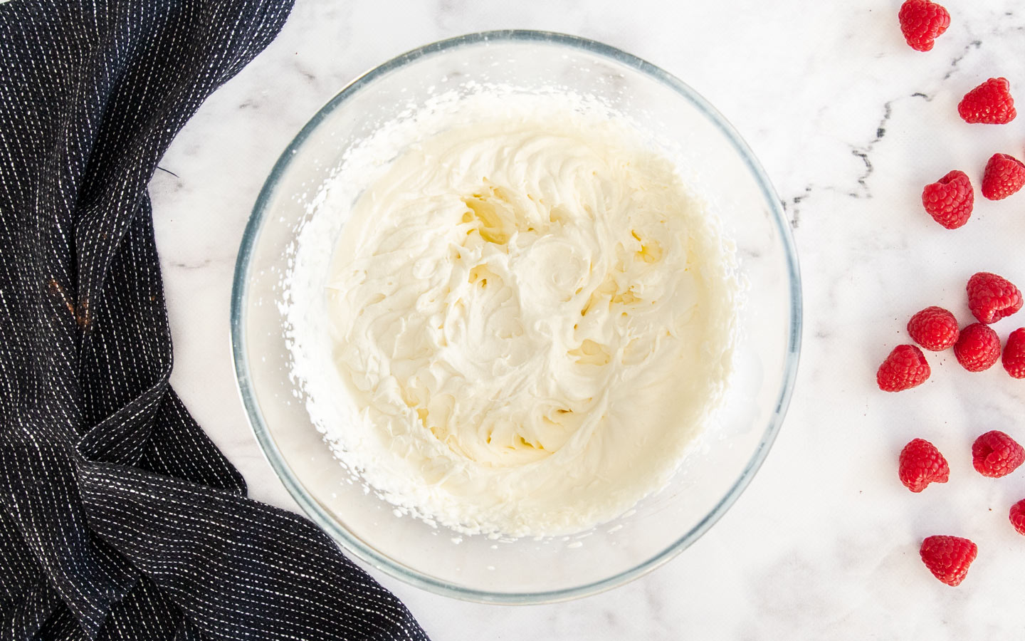 Cream whipped to stiff peaks.