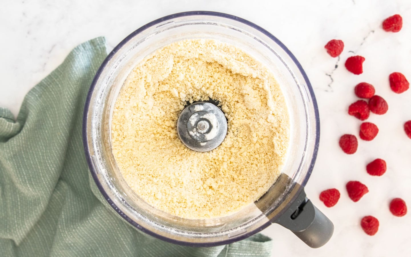 The flour, sugar, butter and egg combined in a food processor until it looks like breadcrumbs.