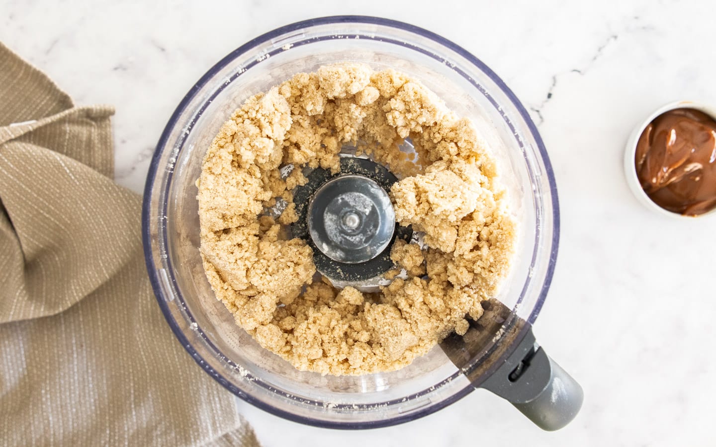 The clumping pastry in the food processor.