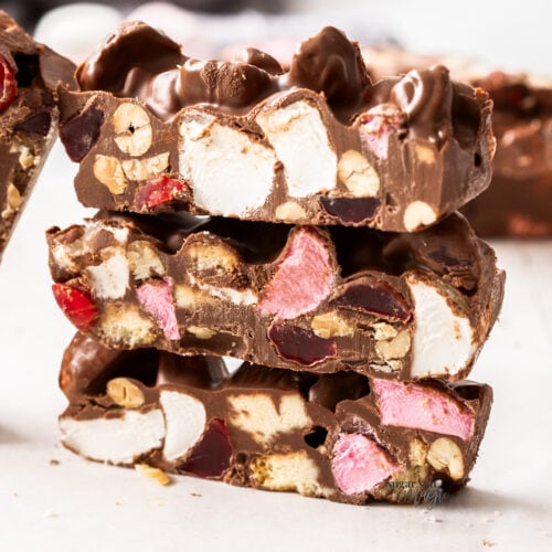 Three slices of rocky road stacked.