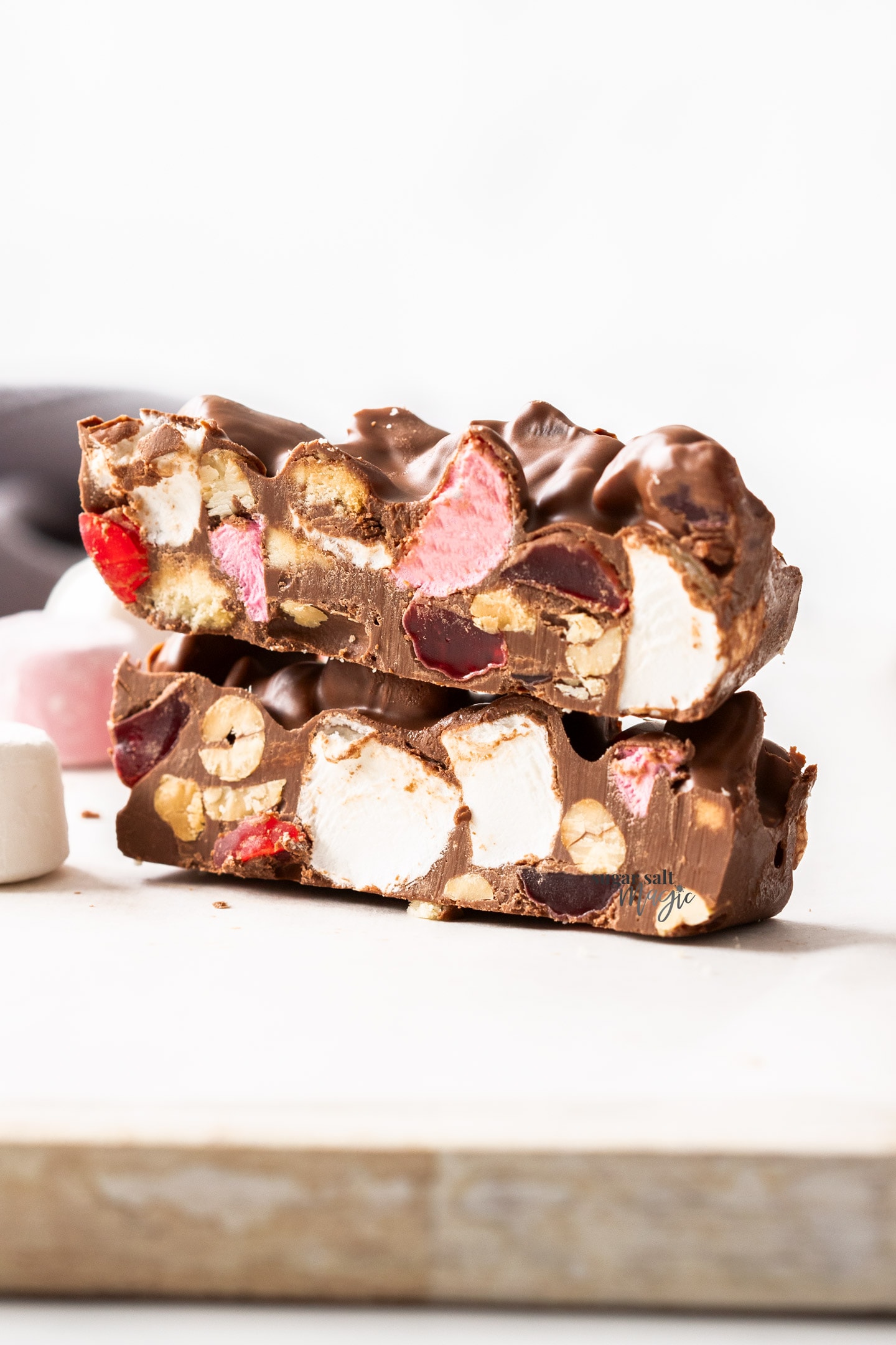 Two slices of rocky road stacked.