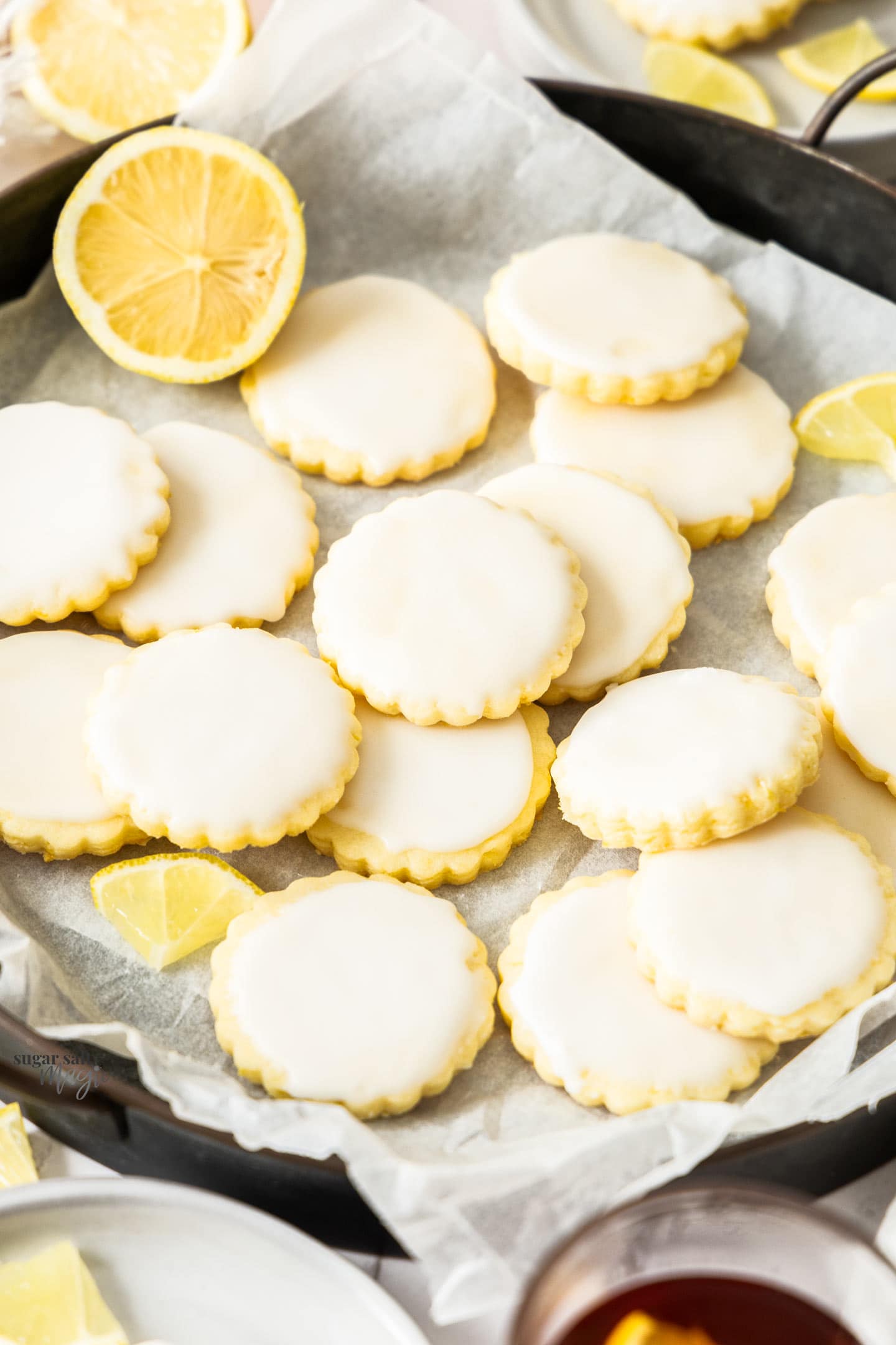 A batch of iced lemon biscuits.