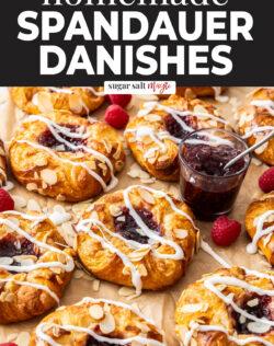 A batch of Danish pastries with jam and icing.