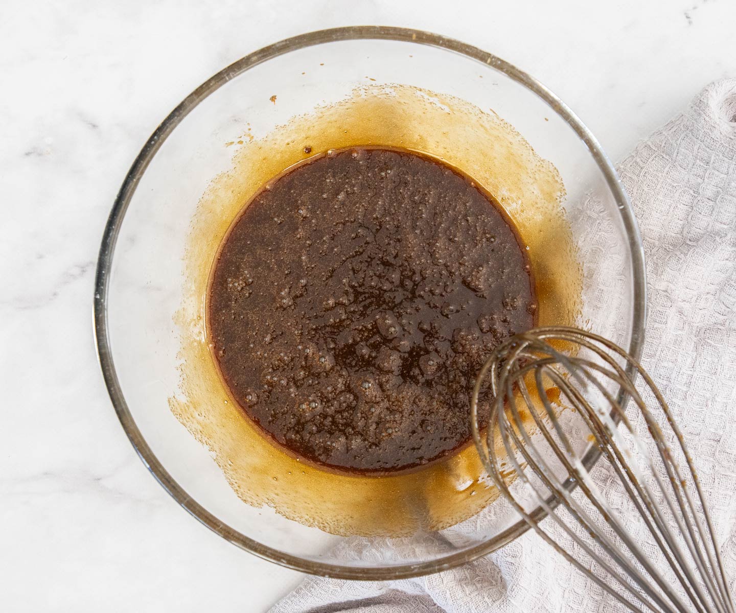 The wet ingredients combined in a mixing bowl.