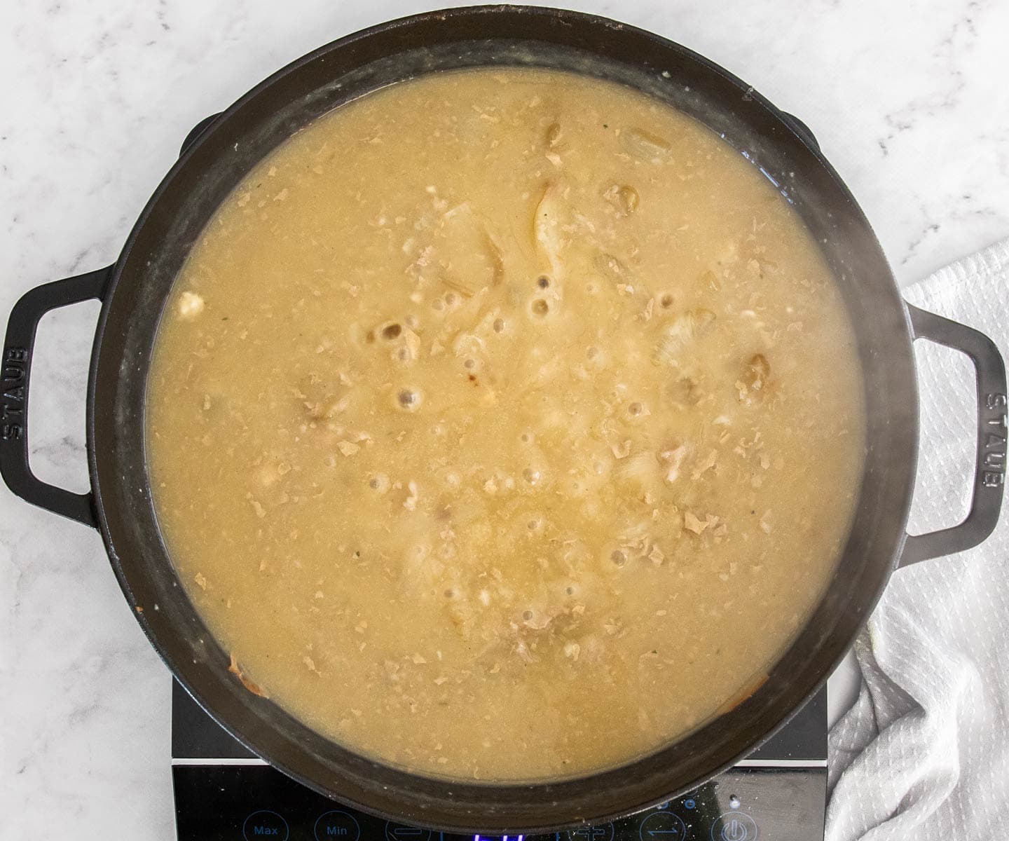 The gravy after the it has thickened and the butter added.