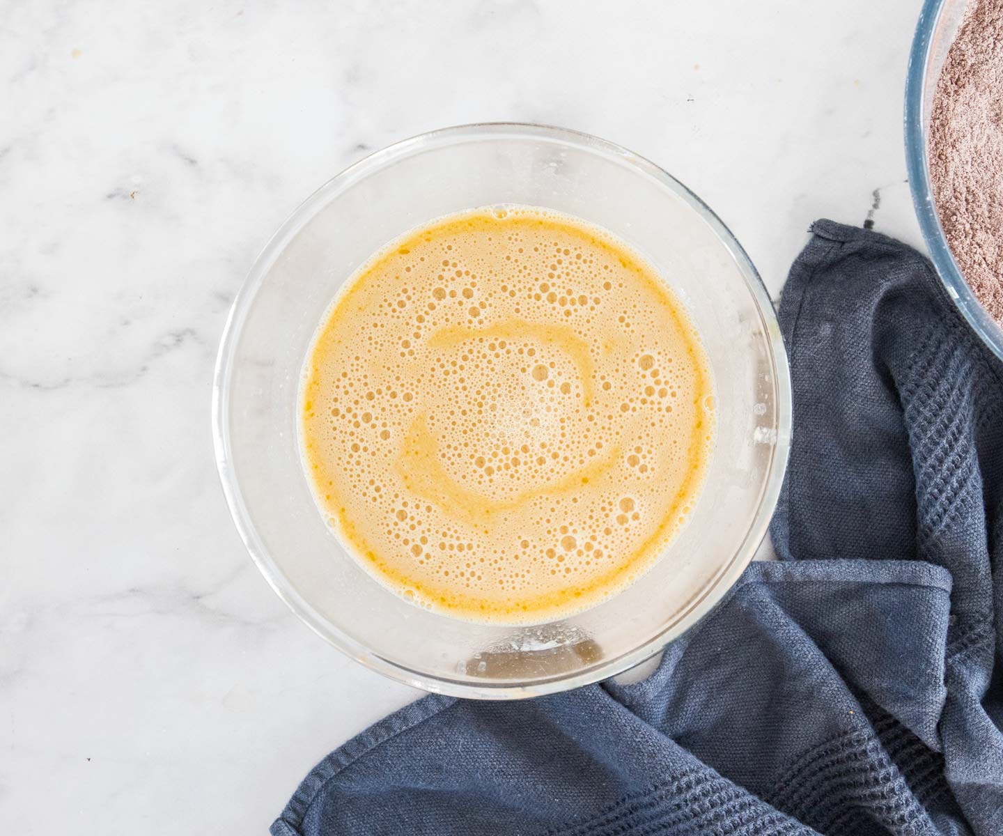 Cherry Chocolate Bundt Cake The wet ingredients combined in a bowl.