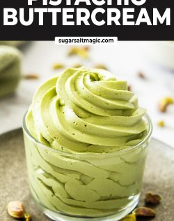 A glass with a big swirl of pistachio buttercream.