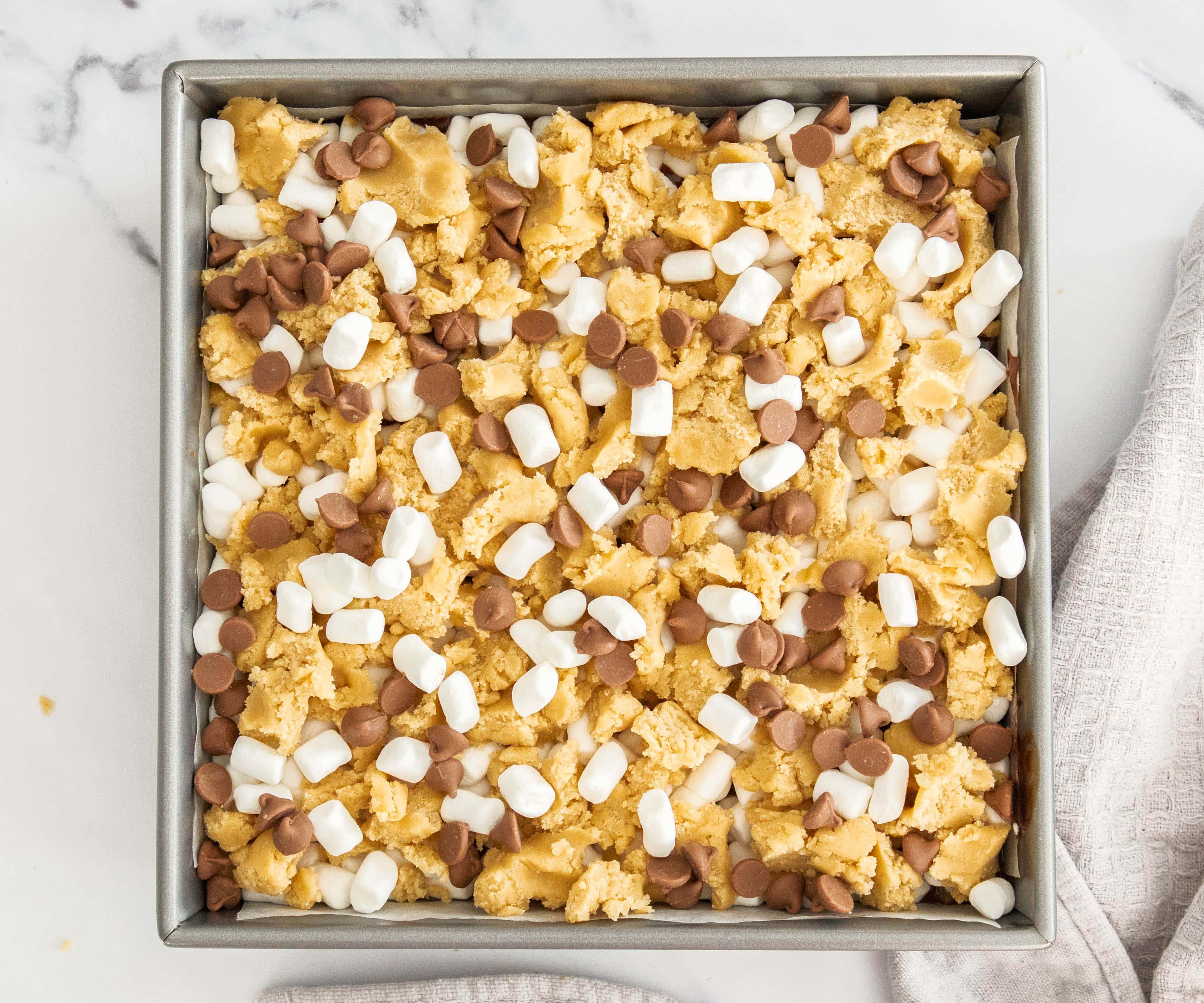 S'mores Cookie Bars The s'mores cookie bars assembled and ready to bake.