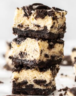 A stack of 3 Oreo cheesecake bars.