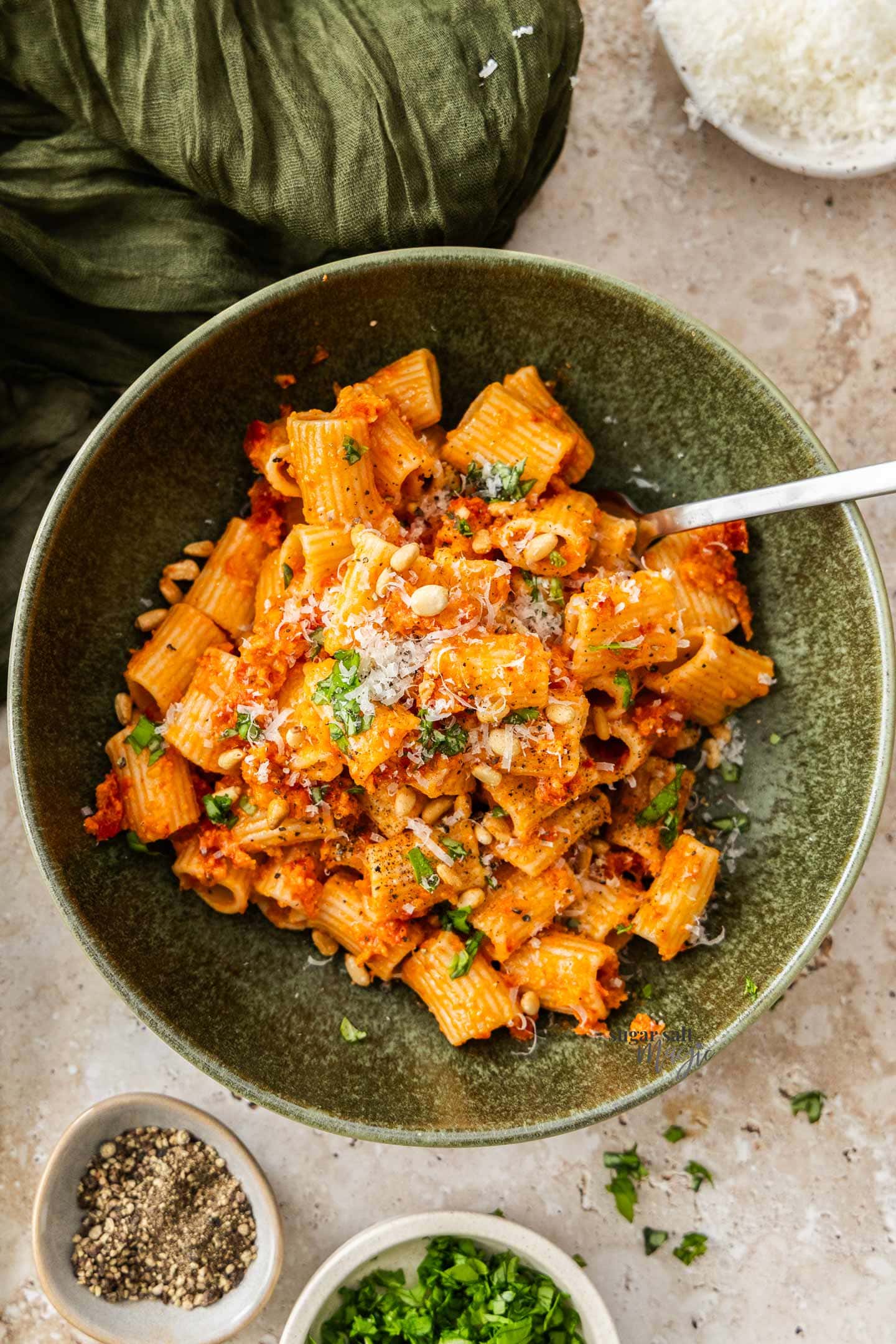 Sun-dried Tomato Pesto Pasta Top down view of a bowl of pasta in a sun dried tomato pesto sauce.